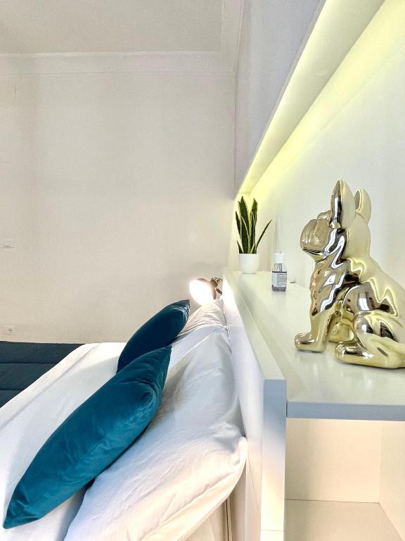Postel nebo postele na pokoji v ubytování Le porte di Lecce Suites