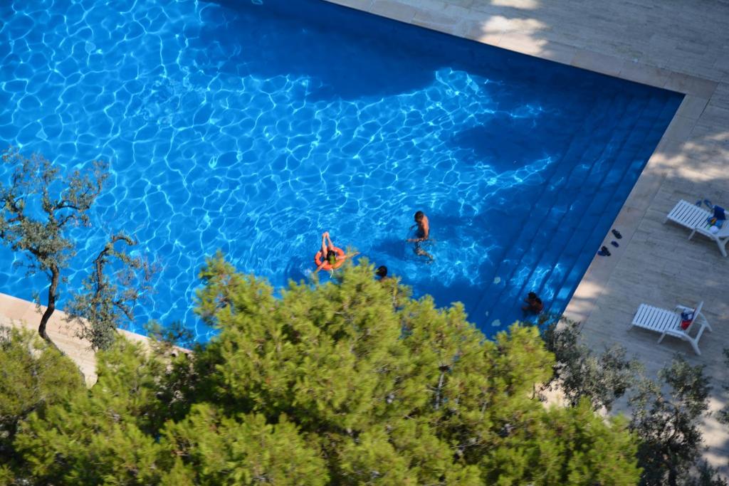 Bazén v ubytování Villaggio Hotel Ripa nebo v jeho okolí