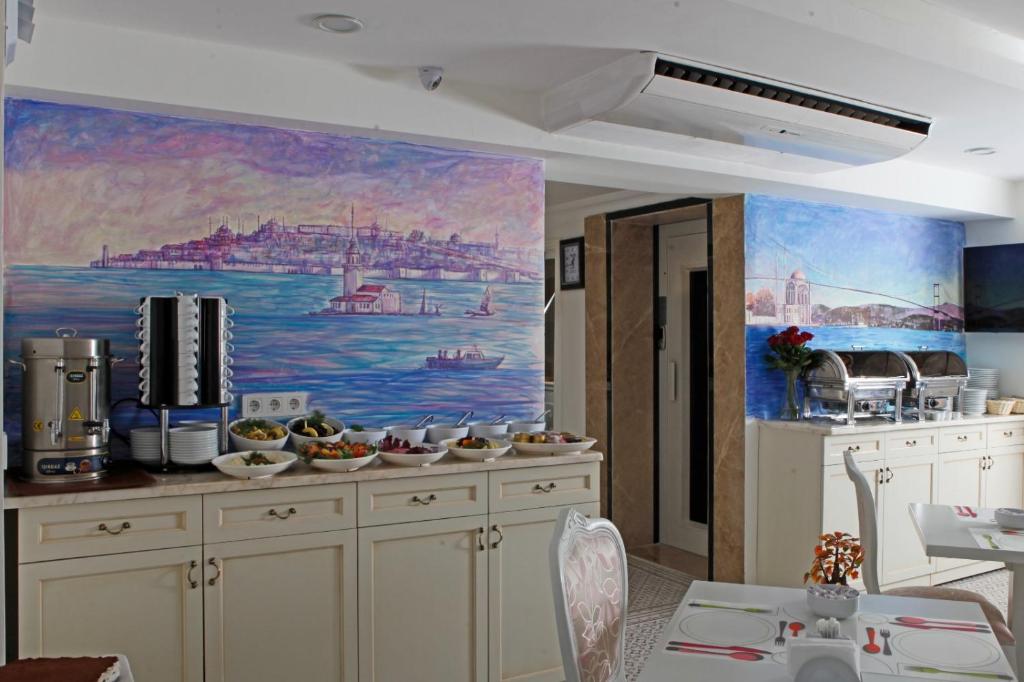 TV a/nebo společenská místnost v ubytování Leyenda Boutıque Hotel