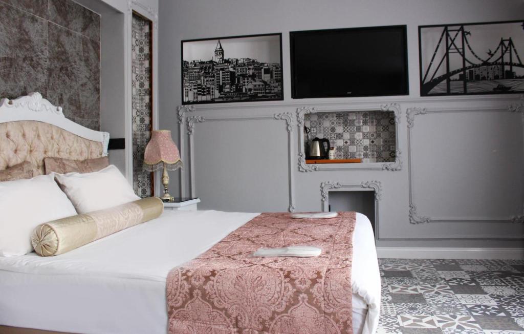 Postel nebo postele na pokoji v ubytování Leyenda Boutıque Hotel