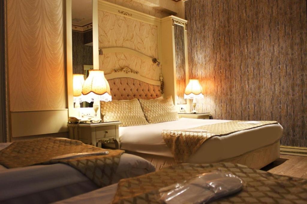 Postel nebo postele na pokoji v ubytování Leyenda Boutıque Hotel