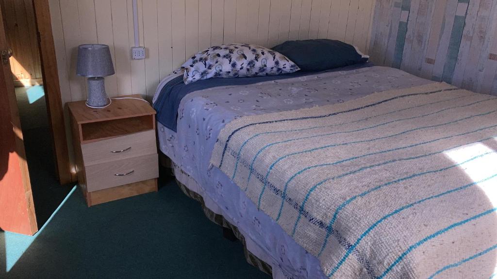 Postel nebo postele na pokoji v ubytování hospedaje Dalcahue