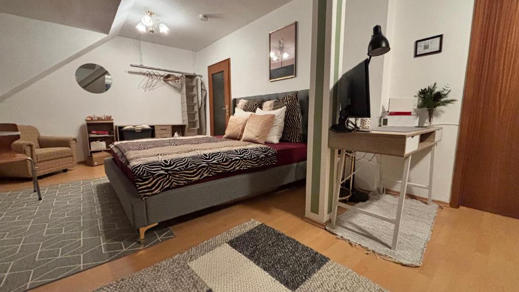 Postel nebo postele na pokoji v ubytování ModerneDG-Wohnung mit Homeoffice