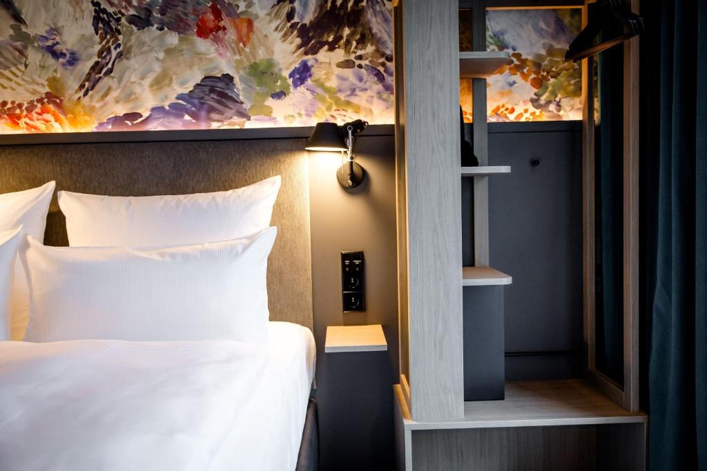 Motel One Antwerpにあるベッド
