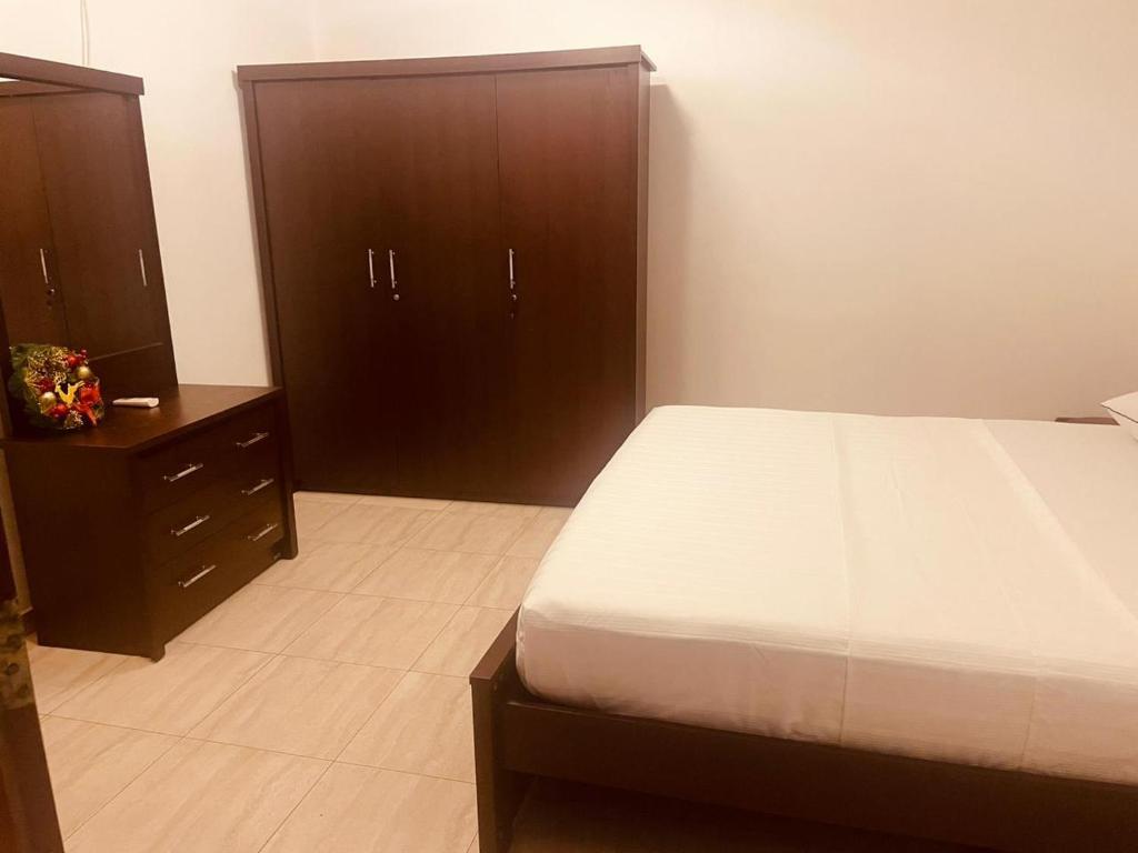Postel nebo postele na pokoji v ubytování Mila Boutique Airport