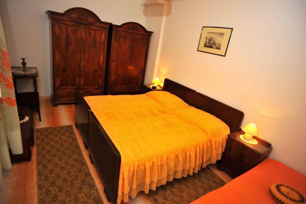 Postel nebo postele na pokoji v ubytování Apartments Piv