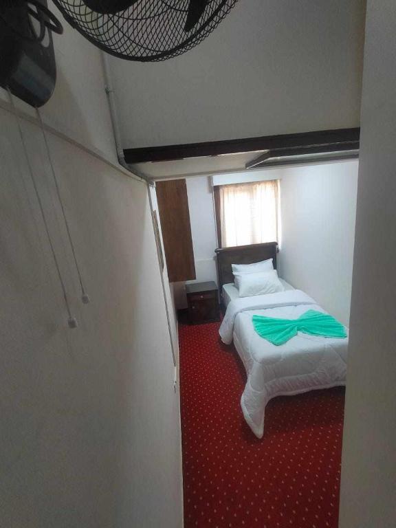 Postel nebo postele na pokoji v ubytování LA Luna Hotel DOWNTOWN