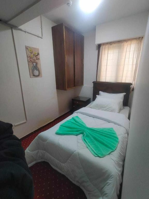 Postel nebo postele na pokoji v ubytování LA Luna Hotel DOWNTOWN
