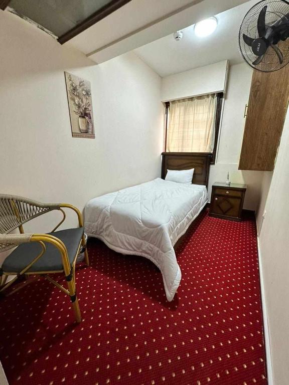 Postel nebo postele na pokoji v ubytování LA Luna Hotel DOWNTOWN