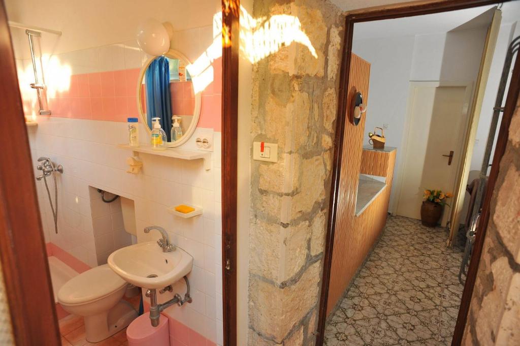 Koupelna v ubytování Apartments Piv