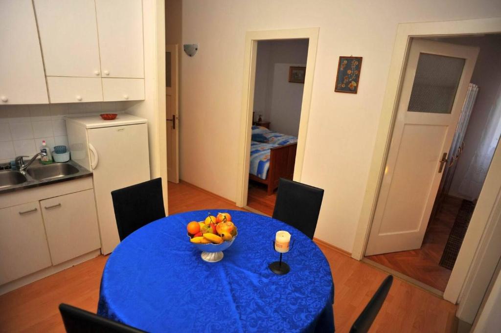 Kuchyň nebo kuchyňský kout v ubytování Apartments Piv