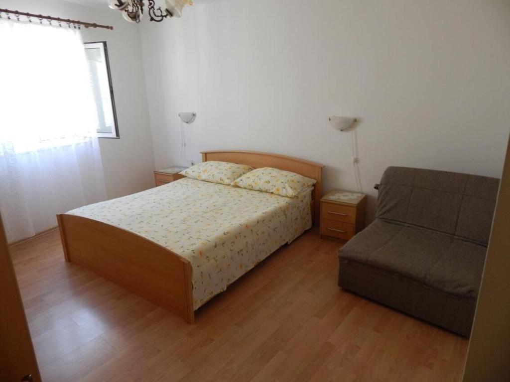 Postel nebo postele na pokoji v ubytování Apartments Zoki