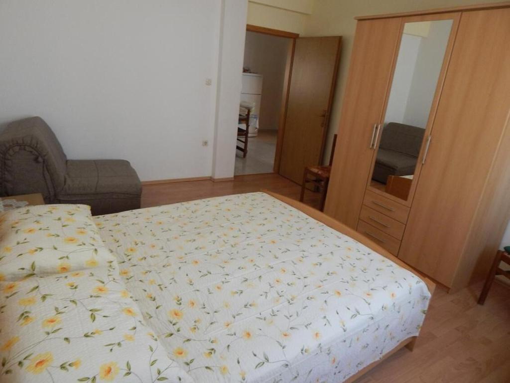 Postel nebo postele na pokoji v ubytování Apartments Zoki