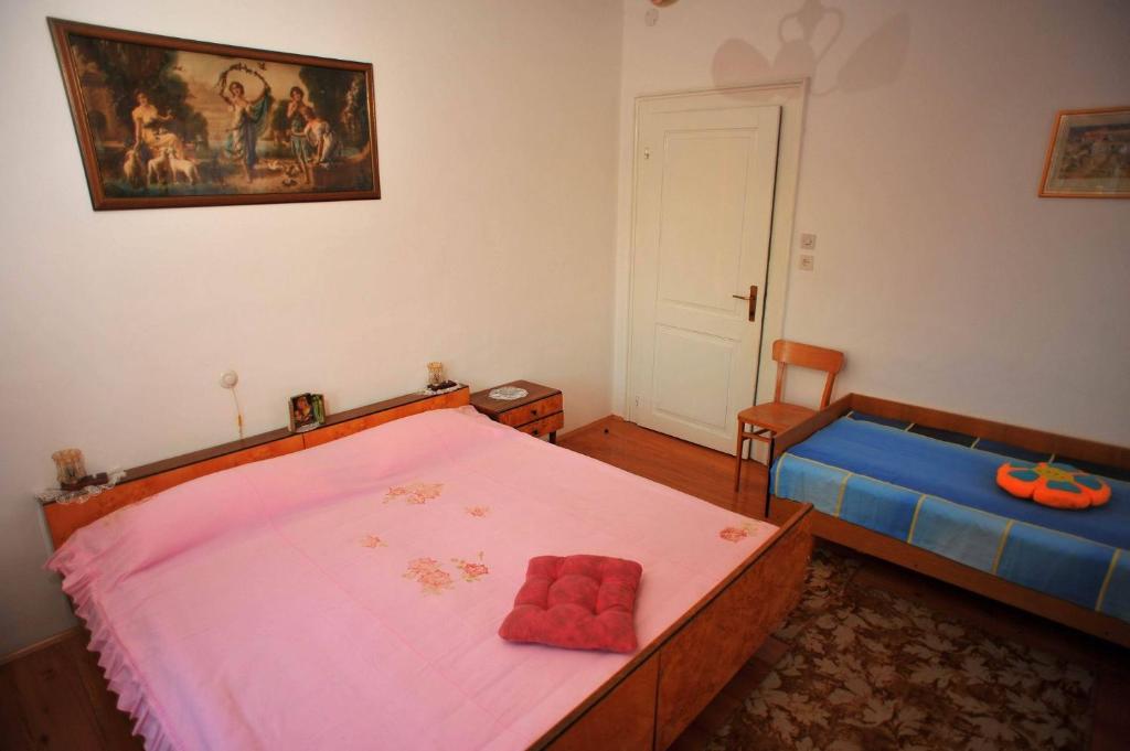 Postel nebo postele na pokoji v ubytování Apartments Piv