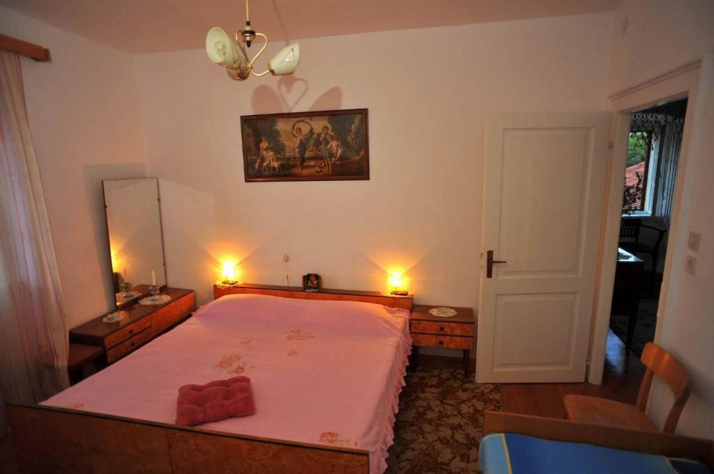 Postel nebo postele na pokoji v ubytování Apartments Piv