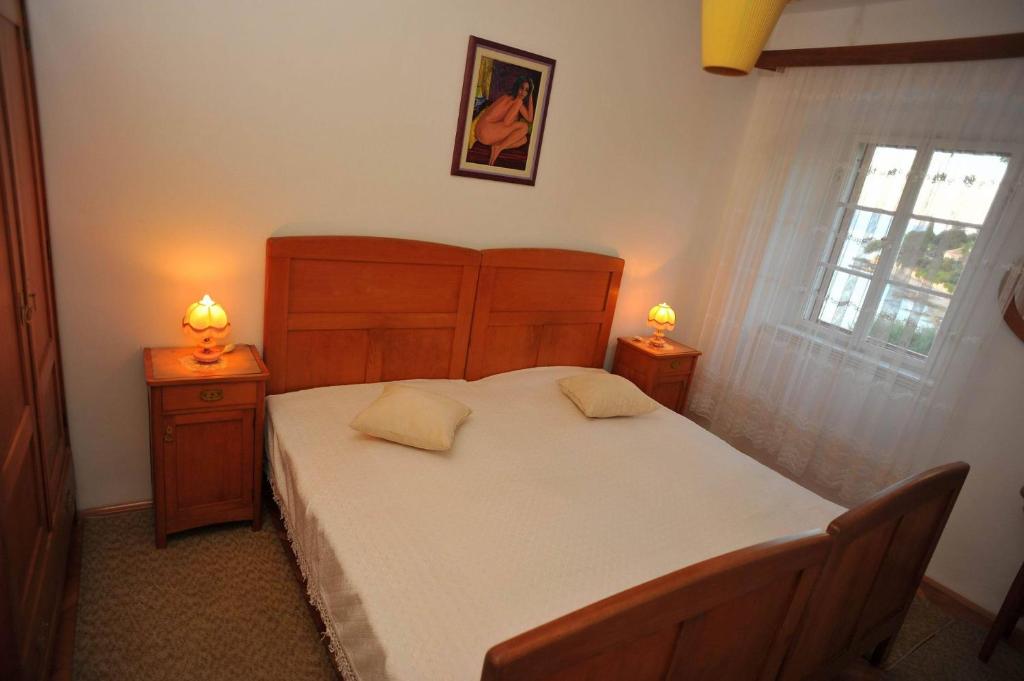 Postel nebo postele na pokoji v ubytování Apartments Piv