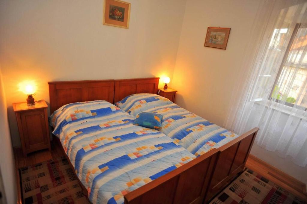 Postel nebo postele na pokoji v ubytování Apartments Piv