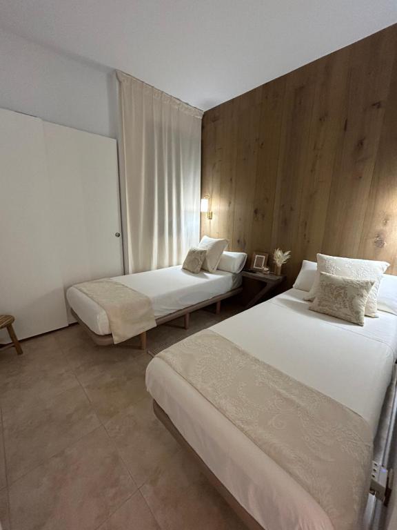 Ένα ή περισσότερα κρεβάτια σε δωμάτιο στο Zen Garden Apartment