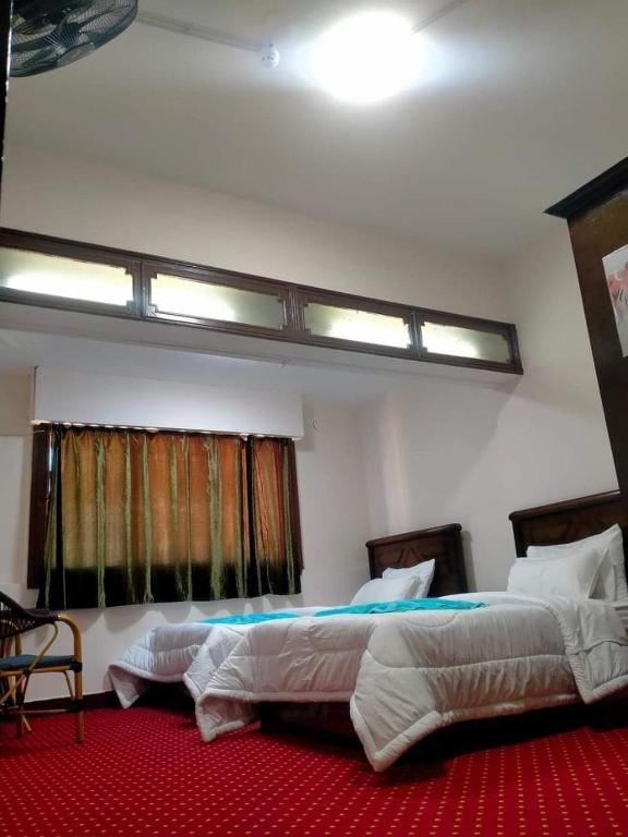 Postel nebo postele na pokoji v ubytování LA Luna Hotel DOWNTOWN