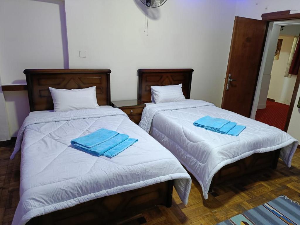 Postel nebo postele na pokoji v ubytování LA Luna Hotel DOWNTOWN