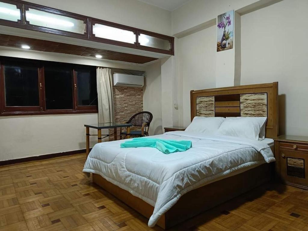 Postel nebo postele na pokoji v ubytování LA Luna Hotel DOWNTOWN