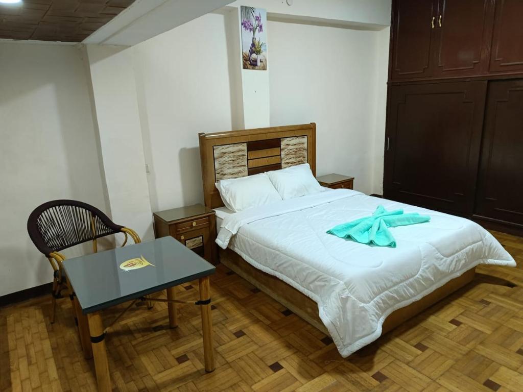 Postel nebo postele na pokoji v ubytování LA Luna Hotel DOWNTOWN