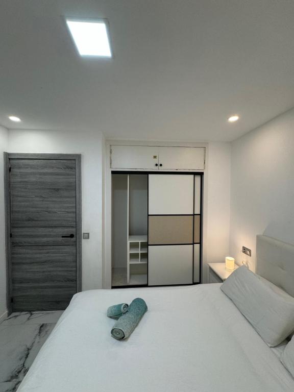 Postel nebo postele na pokoji v ubytování Palma Beach Apartment