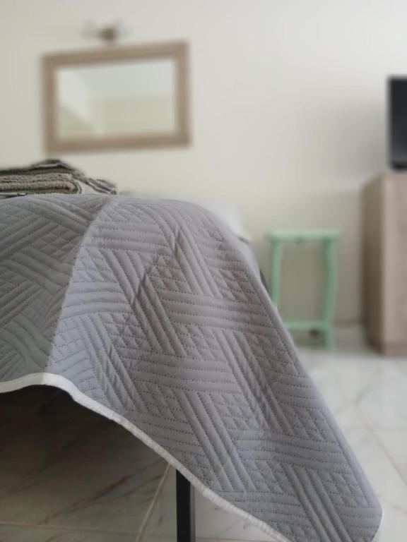 Ένα ή περισσότερα κρεβάτια σε δωμάτιο στο Candyhome