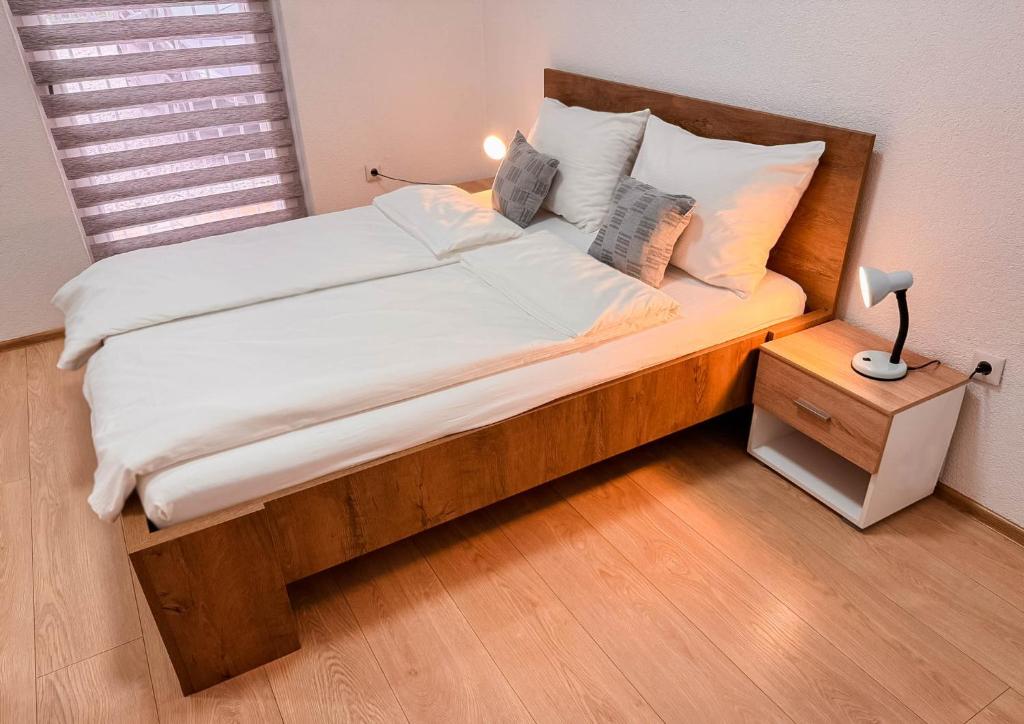Postel nebo postele na pokoji v ubytování Apartments Seyda