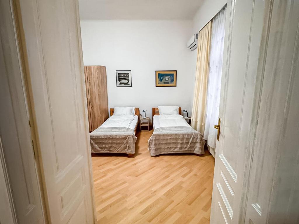 Postel nebo postele na pokoji v ubytování Apartments Seyda
