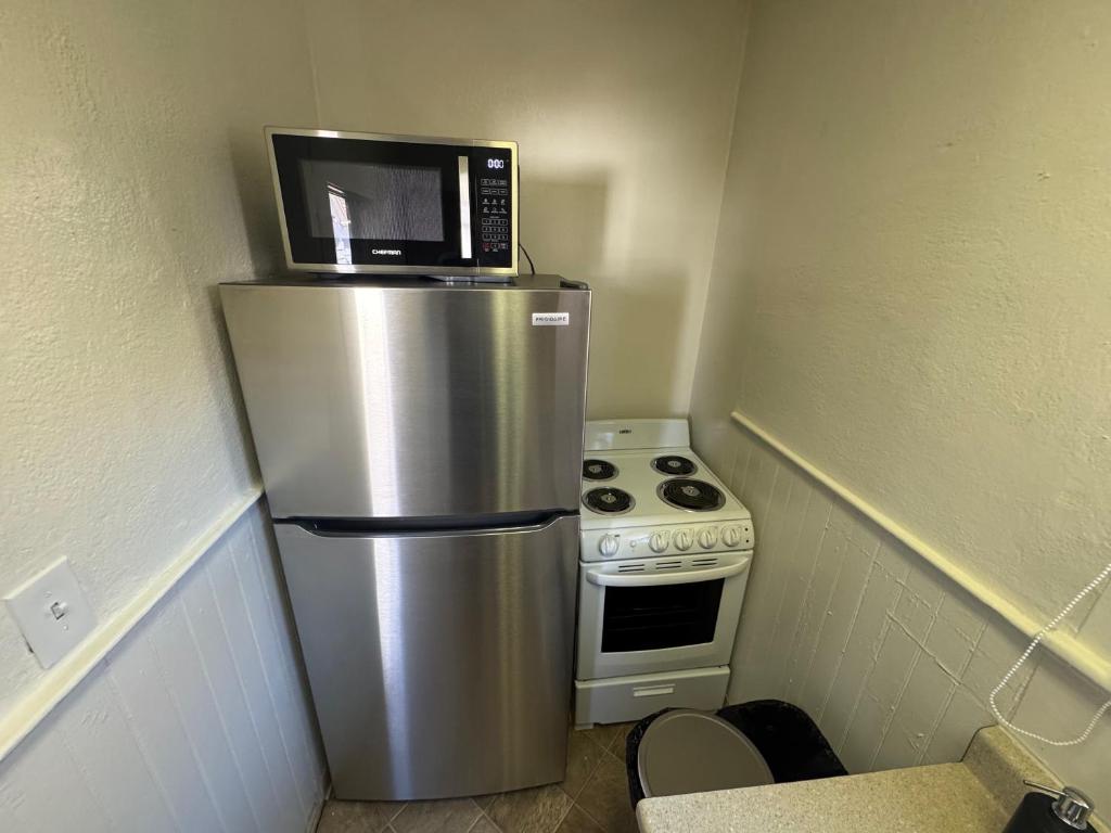 Kuchyň nebo kuchyňský kout v ubytování Midtown Hideaway 1 BR Nest
