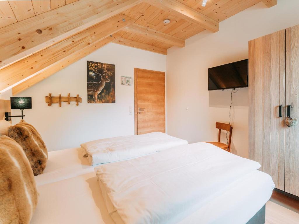 Posteľ alebo postele v izbe v ubytovaní Chalet Norah