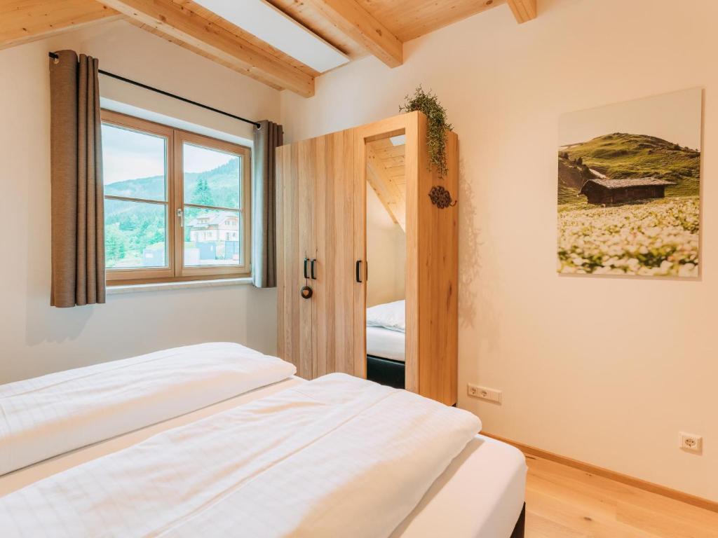 Posteľ alebo postele v izbe v ubytovaní Chalet Norah