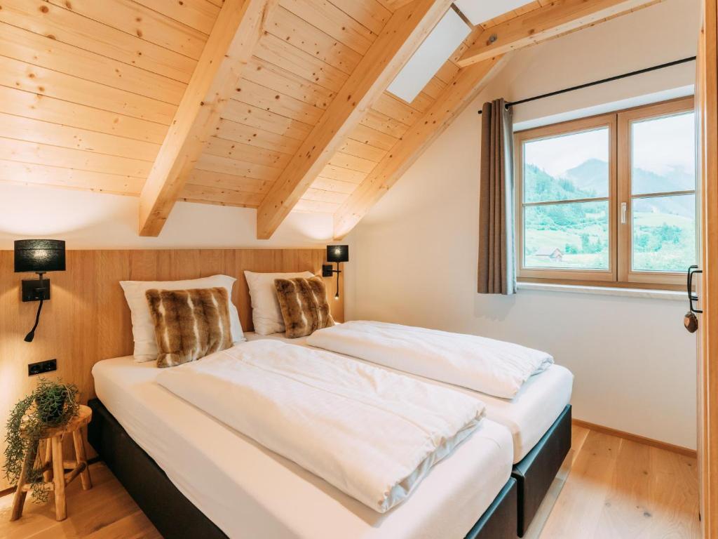 Posteľ alebo postele v izbe v ubytovaní Chalet Norah