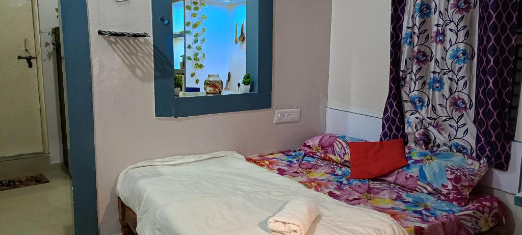 Postel nebo postele na pokoji v ubytování ADH Grand Amilia Elite PG