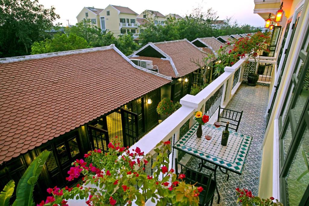 Balkón nebo terasa v ubytování Nature Resort Hoi An By K D H