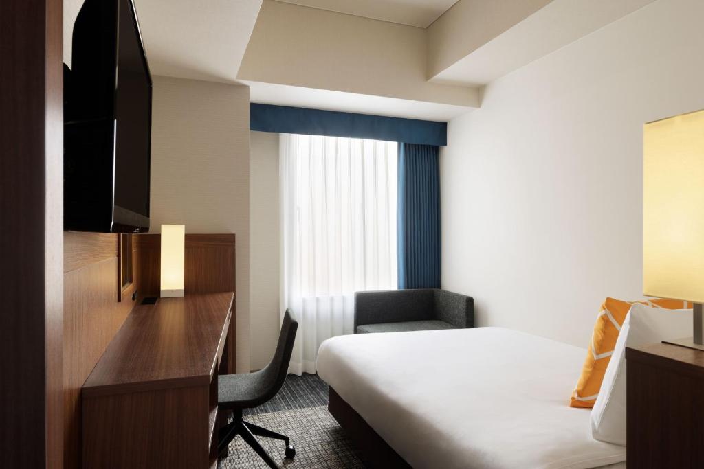 TV a/nebo společenská místnost v ubytování Four Points Flex by Sheraton Kyoto Oike