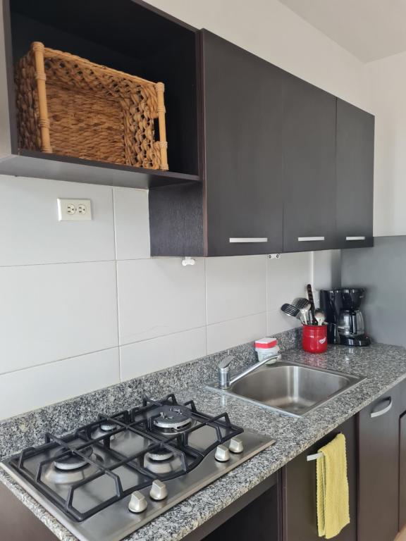 Kuchyň nebo kuchyňský kout v ubytování Relajante villa cerca de la playa