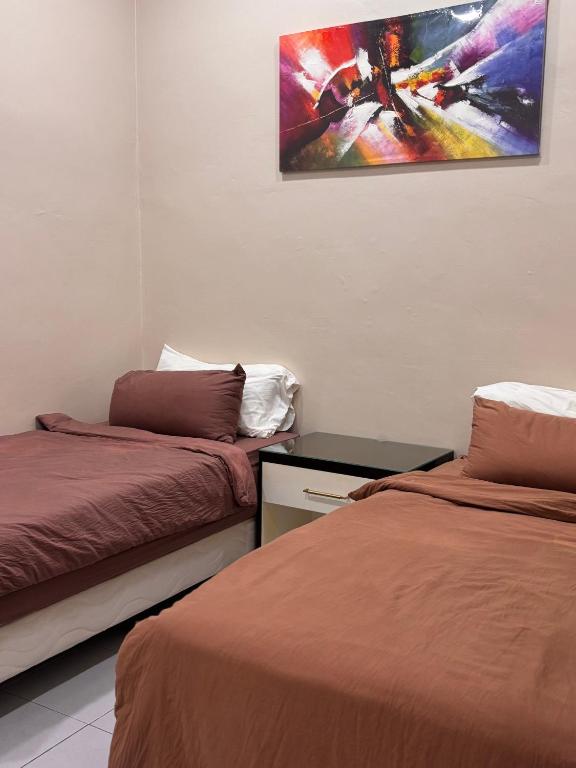 Postel nebo postele na pokoji v ubytování Lodging Mak Endon