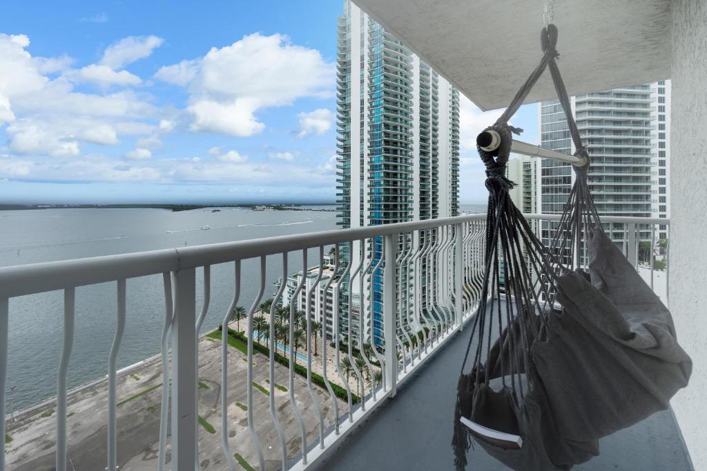 a balcony with a view of the ocean and a building at Oceanview Haven Spacious Inviting for 8 Guests in Miami