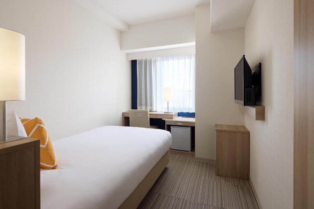 TV a/nebo společenská místnost v ubytování Four Points Flex by Sheraton Osaka Kitahama