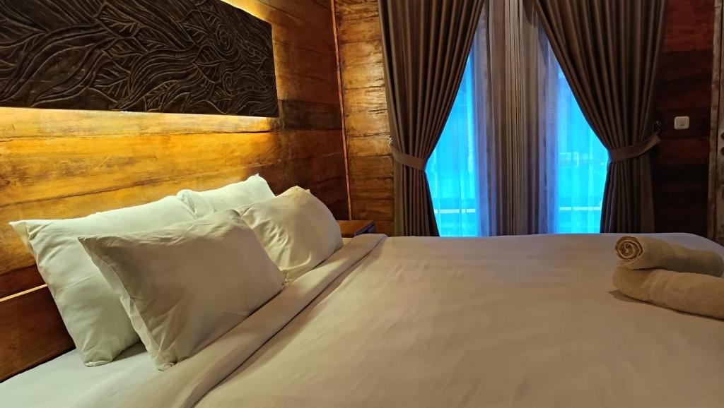 Postel nebo postele na pokoji v ubytování Villa Nusa Summerville