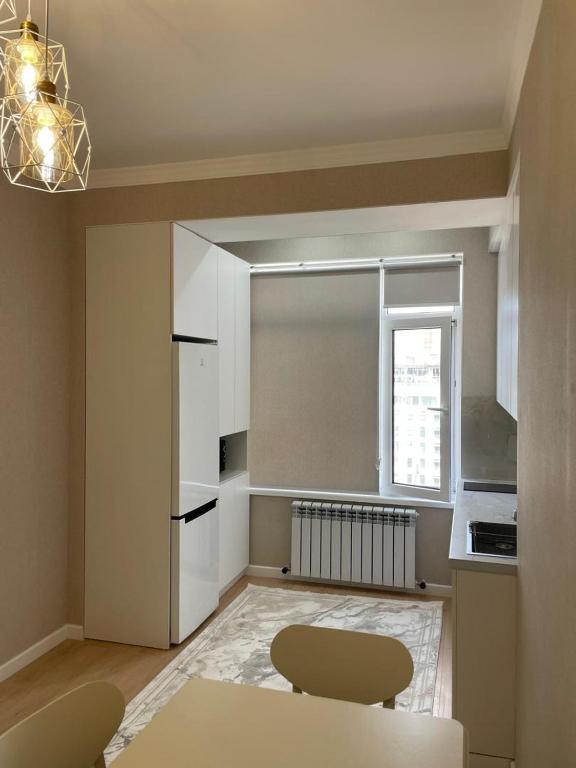 Llit o llits en una habitació de Квартира
