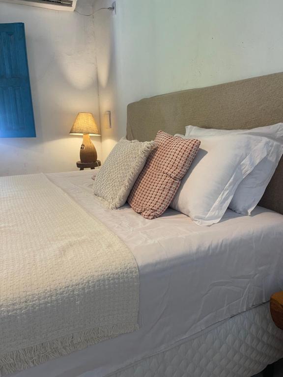 Postel nebo postele na pokoji v ubytování Casa temporada Trancoso Casa Bonfim