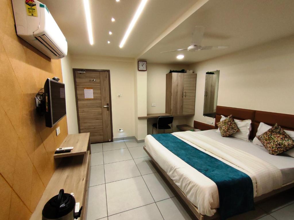 Postel nebo postele na pokoji v ubytování Hotel Kinara