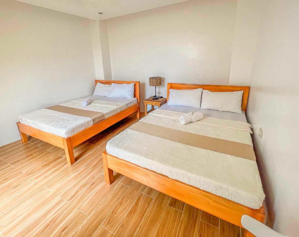 Postel nebo postele na pokoji v ubytování Casita Lodge