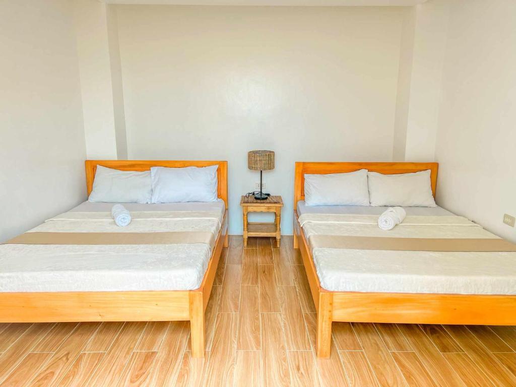 Postel nebo postele na pokoji v ubytování Casita Lodge