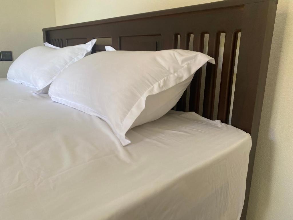 Postel nebo postele na pokoji v ubytování 7 Day Resort