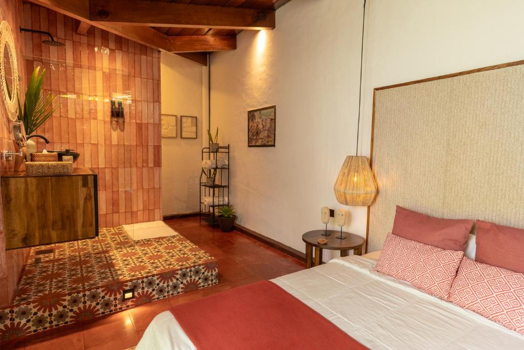Postel nebo postele na pokoji v ubytování Finca Escalante