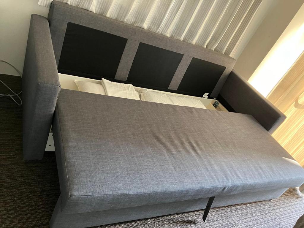 Postel nebo postele na pokoji v ubytování 山中ビル3Fーワンフロア貸切48平方メートルone floor private room